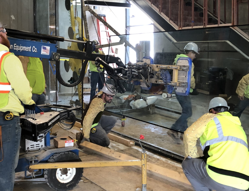 A team works on glazing items